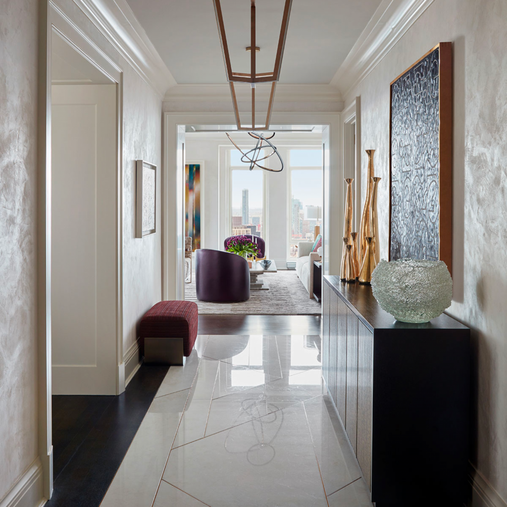 Sophisticated hallway in a NYC loft.  Image is part of a larger portfolio with projects that are neutral yet have pops of color.