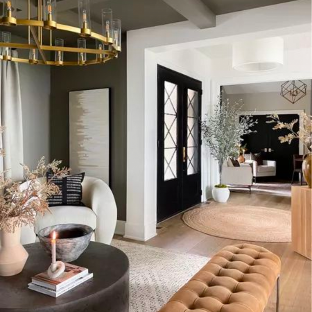 Neutral color palette entryway built to be timeless.  Transitional design style with brass light fixture.