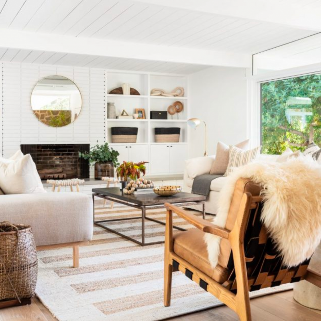 livin-room-design-with-neutral-color-palette-leather-armchair-fur-throw-light-airy